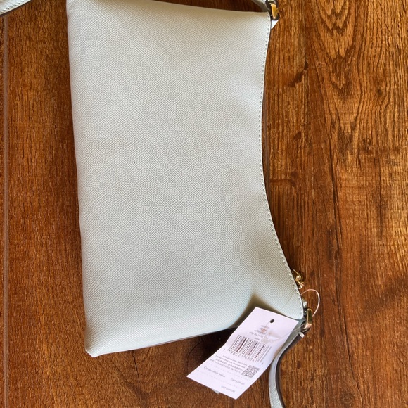 NWT Kate Spade Sadie Crossbody it’s in a “Crisp Sky” blue. It’s very light blue - Picture 4 of 11